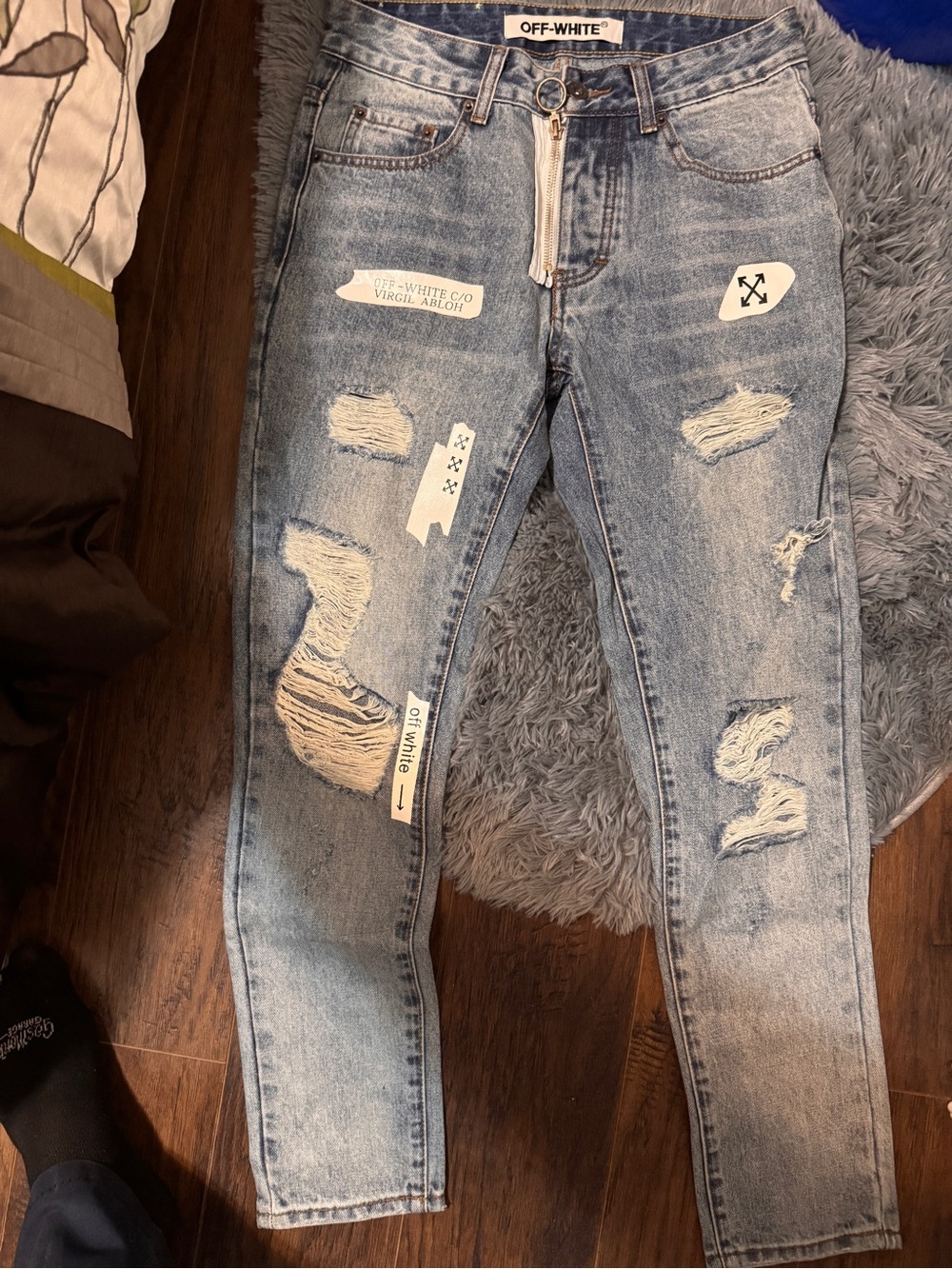 Off-White Light Wash Distressed Skinny Jeans with Signature Labels